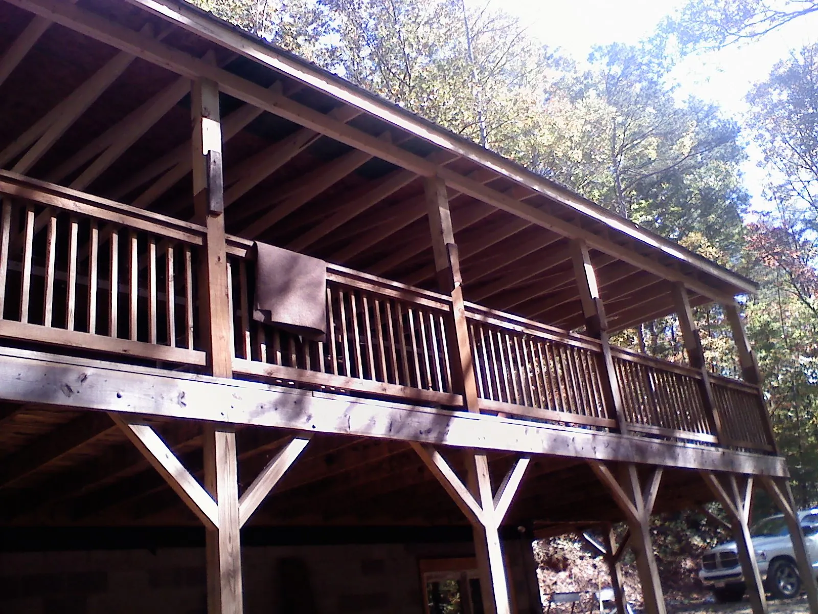 Timber framing under a new elevated porch and deck — Roof Leak Repair in Ute by Roofing Brothers